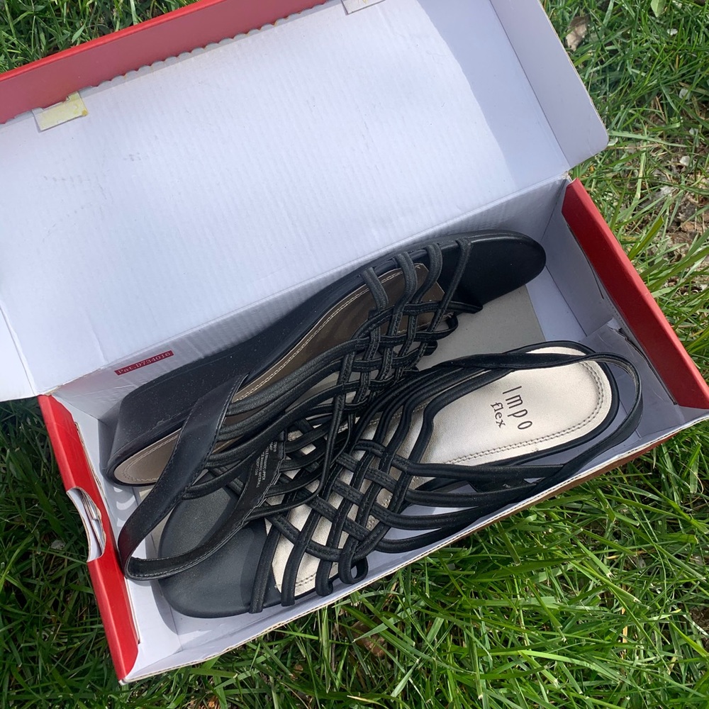 Brand new black sandals